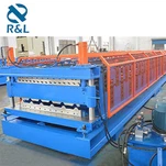 Macchina per la formatura di rotoli a doppio strato