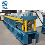 Macchina per la formatura di rulli per tapparelle